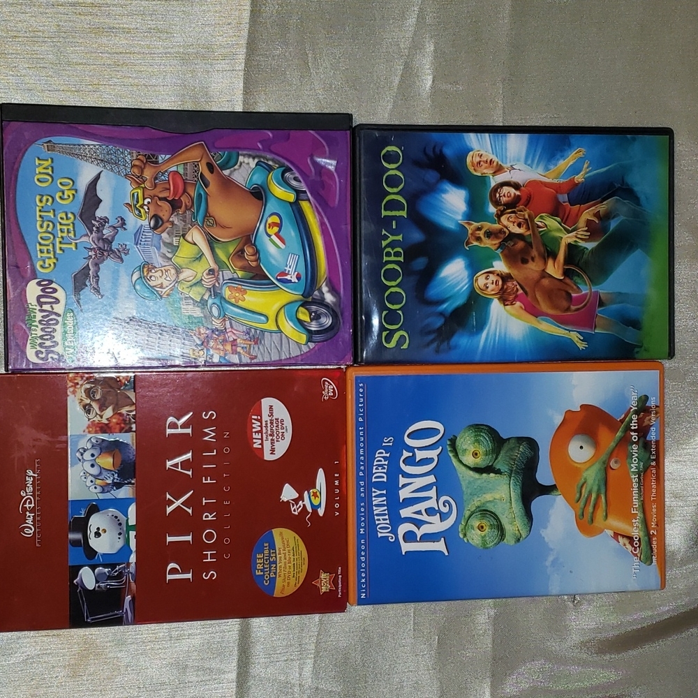 Lot of 4 DVDs Children's Film Animated Cartoon TV Series Scooby Doo, Rango...